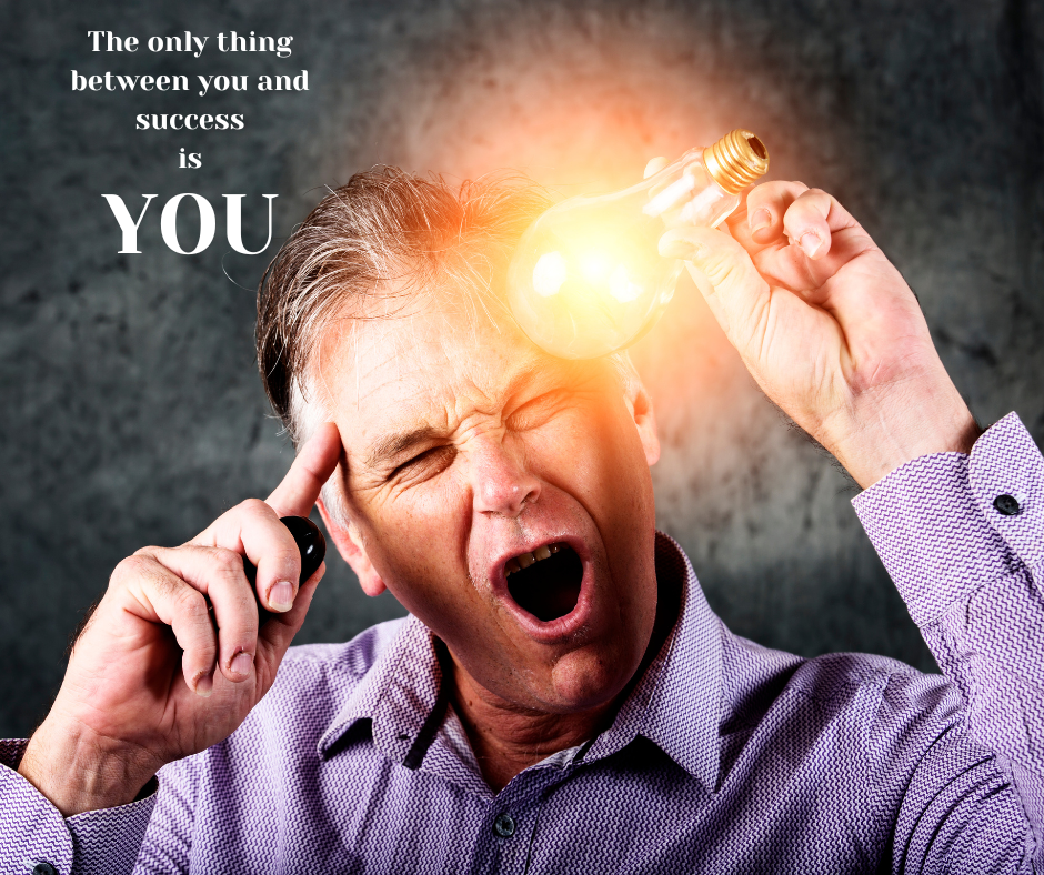 Entrepreneur having a lightbulb moment after discovering a simple system to earn from home.