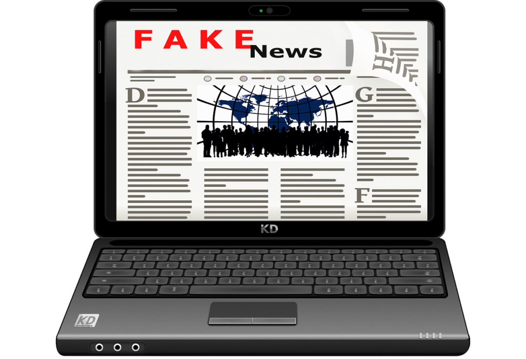Fake news headline on a laptop symbolizing false promises in online business